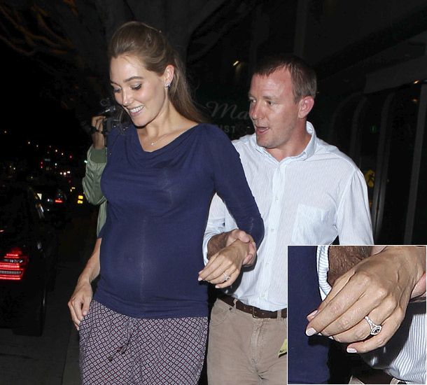 Guy Ritchie engaged: Guy holds up Jacqui's diamond clad hand after ...