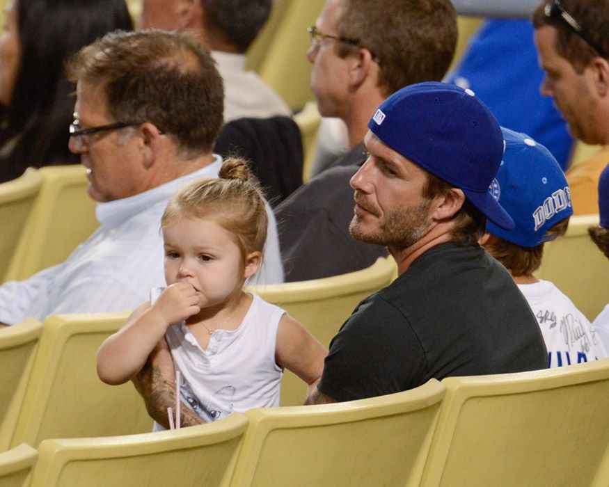 Harper Beckham looks after dad David Beckham as they attend baseball ...