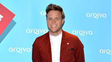 Olly Murs at event in burgundy jacket