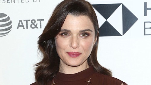 Rachel Weisz shows off her baby bump as she walks the red carpet for the first time since announcing pregnancy
