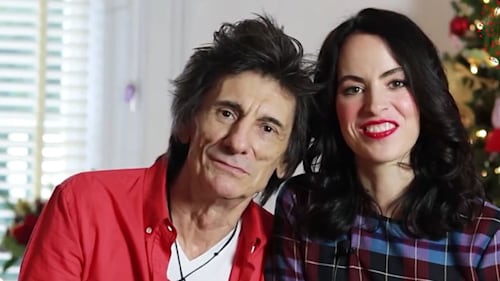 Ronnie and Sally Wood prepare to dress their daughters up for Christmas day