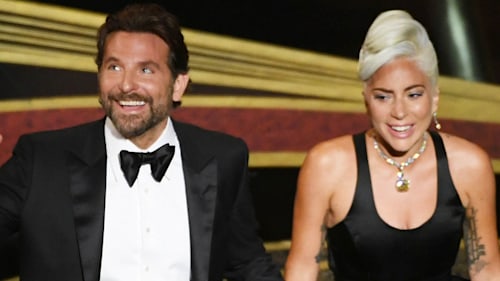 Lady Gaga and Bradley Cooper raise eyebrows with intimate Oscars performance
