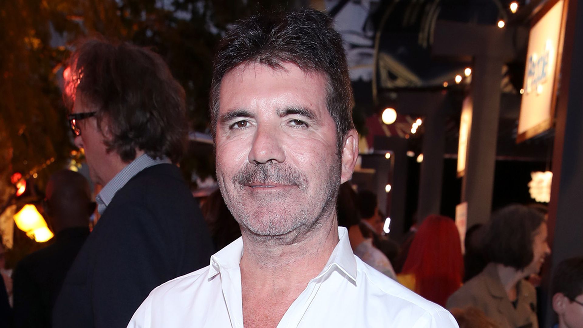 Simon Cowell's son Eric is one cheeky monkey! See the photo HELLO!