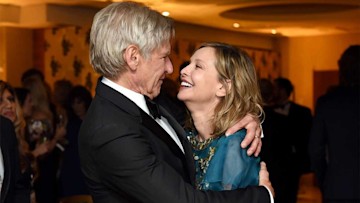 harrison ford and wife calista flockhart hugging 