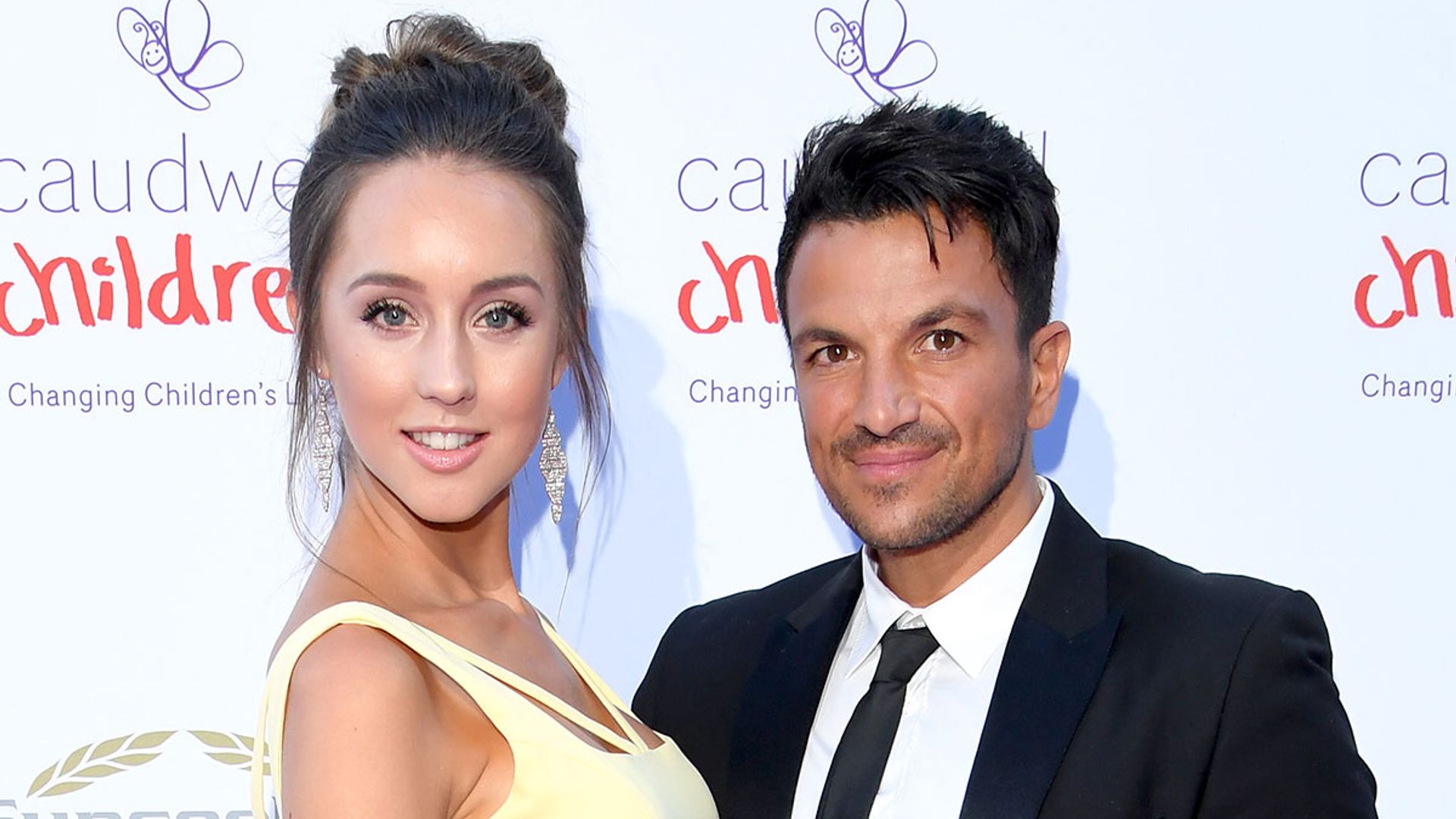 Peter Andre's wife Emily shows off tiny waist and washboard abs in gym ...