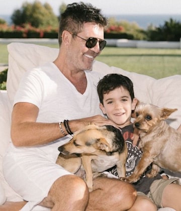 How is Simon Cowell recovering post-surgery after breaking back? HELLO!