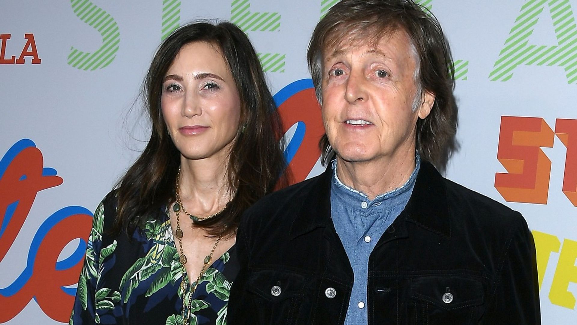 Paul McCartney and wife Nancy Shevell look so in love as they cuddle up