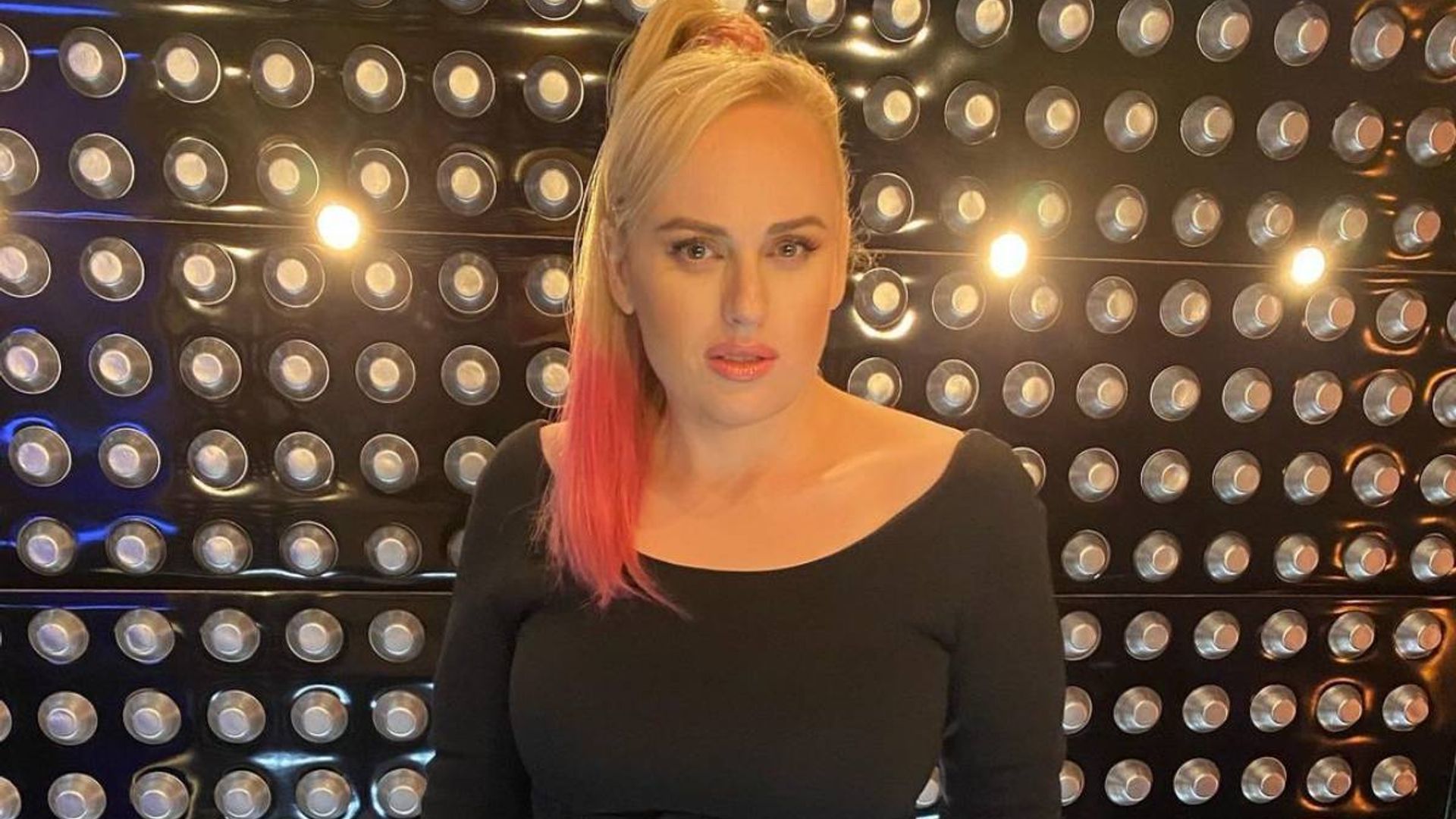 Rebel Wilson’s body looks phenomenal in plunging orange catsuit - and ...