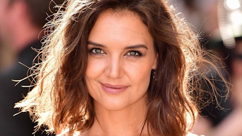 Katie Holmes shares stunning beach photo wearing strappy black swimsuit - and fans react