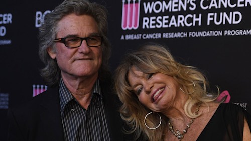 Goldie Hawn and Kurt Russell caught kissing in loved-up backstage photo - fans react