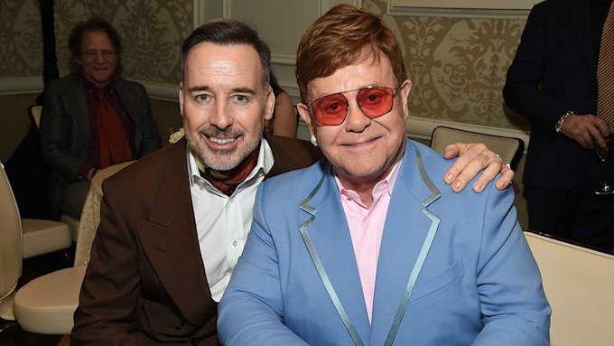 David Furnish gives update on Elton John's health as he isolates ahead of surgery