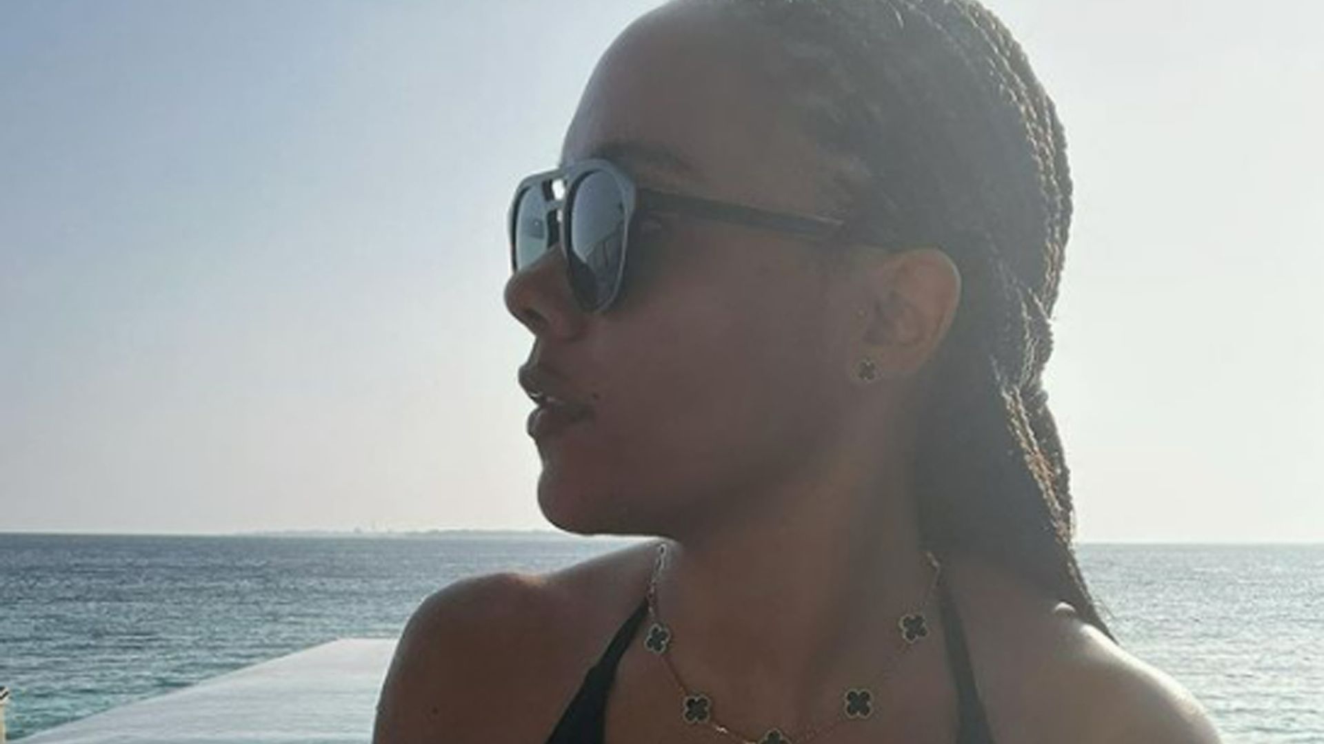 Alex Scott causes a stir as she shows off endless legs in tropical