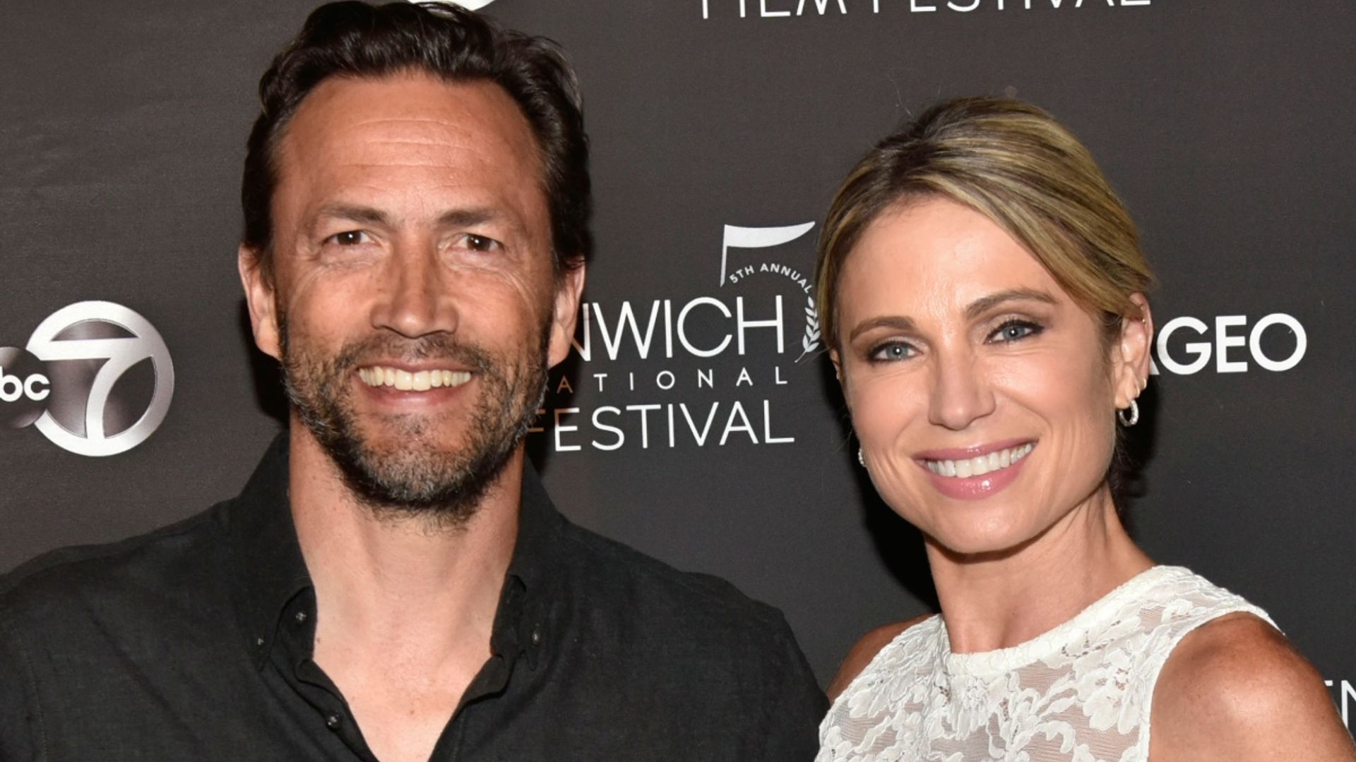 Amy Robach Marks Major Moment While Away From GMA With Husband Andrew Shue In Loved Up Photos