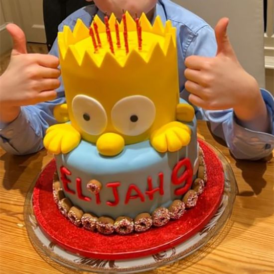 Elton John and David Furnish's son poses with his INSANE birthday cake! |  HELLO!