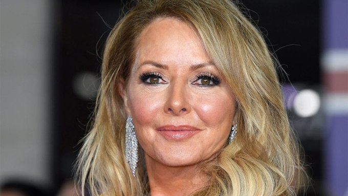 Carol Vorderman sizzles in flirty low-cut jumpsuit | HELLO!