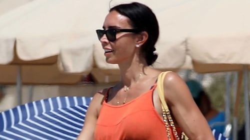 Christine Lampard stuns in orange summer dress during Spanish holiday with children and husband Frank