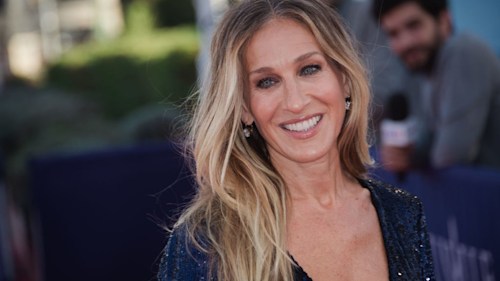 Sarah Jessica Parker looks stylish in black swimsuit during family trip to the beach