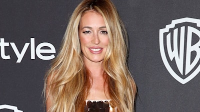 Cat Deeley puts on a flirty display in chic white bikini and colourful cover-up during LA getaway