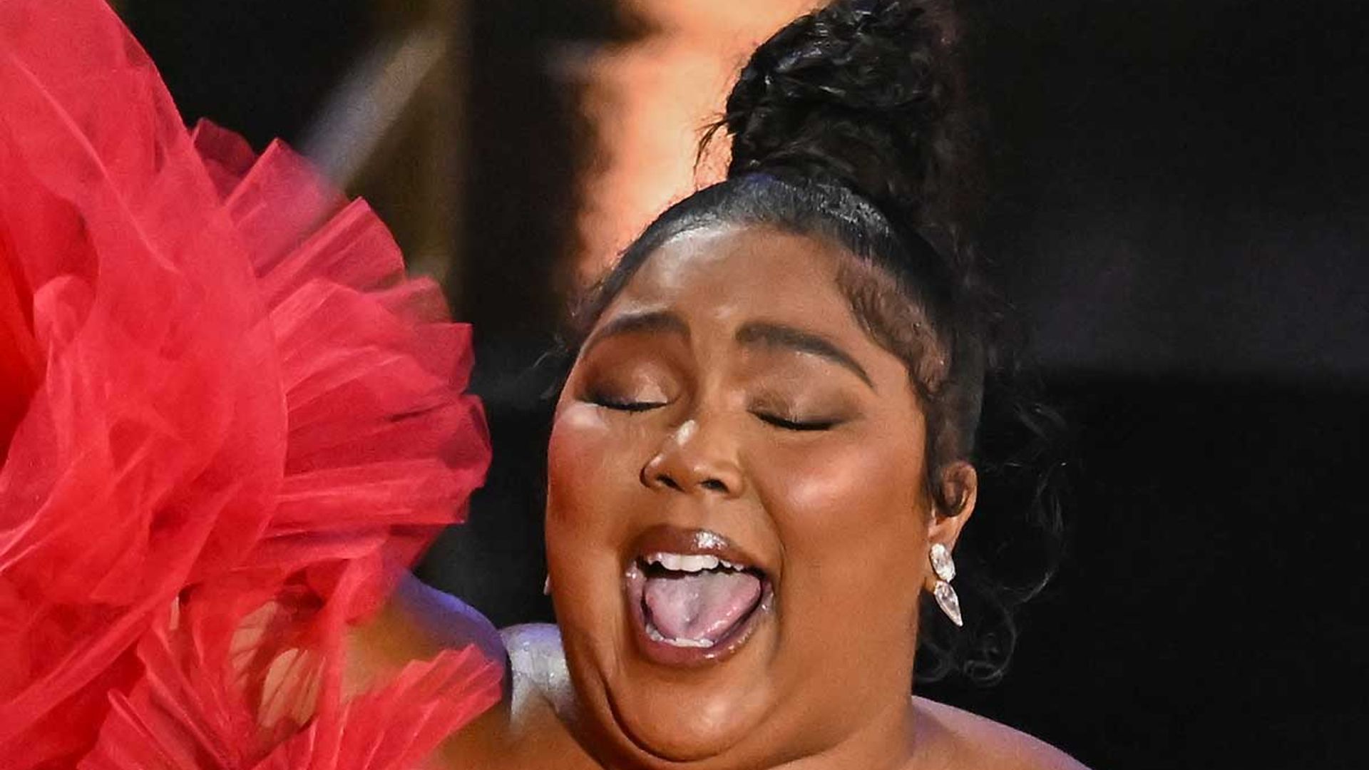 Lizzo wells up during emotional acceptance speech at the 2022 Emmys
