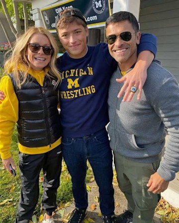 Kelly Ripa looks tiny alongside her youngest son – and he is so grown