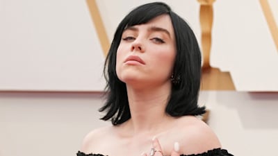 Billie Eilish shares loving message in poolside swimsuit video