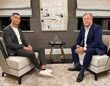 Cristiano Ronaldo poses with Piers Morgan during their interview