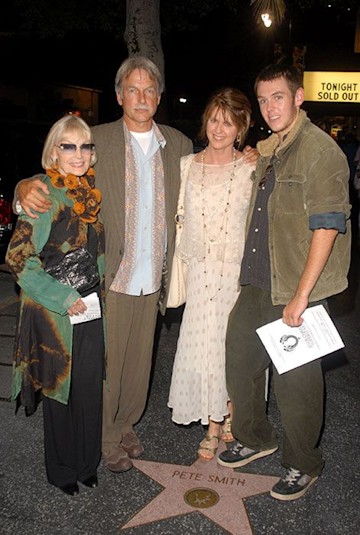 mark harmon posing with his wife and son