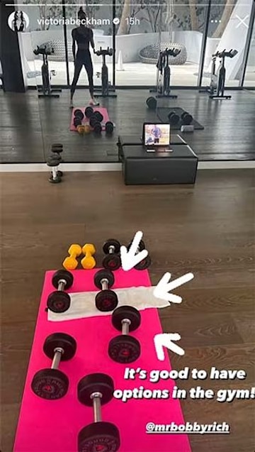 Victoria Beckham's home gym with a pink mat on the floor