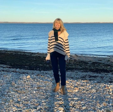 Christie Brinkey Smiling by a lake