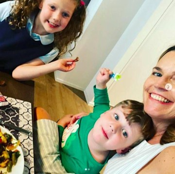 NBC star Savannah Guthrie with her two children at home