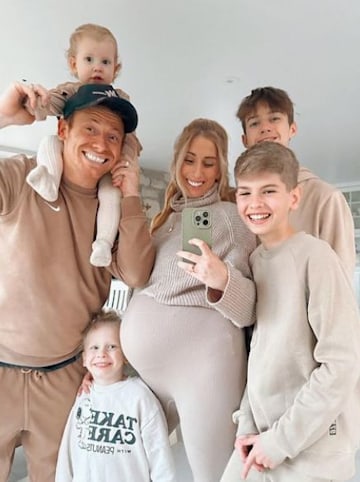 stacey solomon poses with her four children and joe swash
