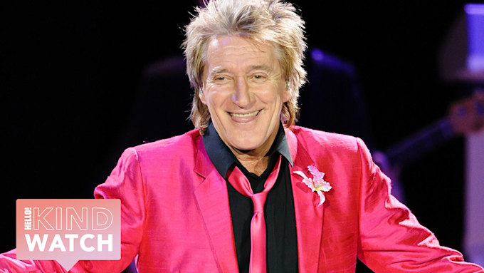 Rod Stewart stands out in bright pink suit