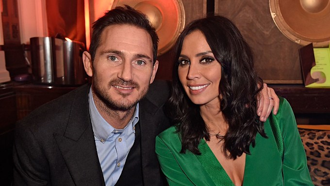 Christine Lampard and Frank posing together at an event
