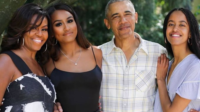 Michelle Obama and Barack with their daughters Malia and Sasha