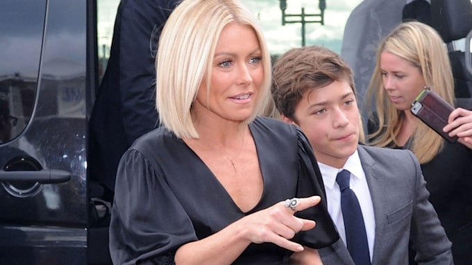 kelly ripa posing on red carpet with son joaquin