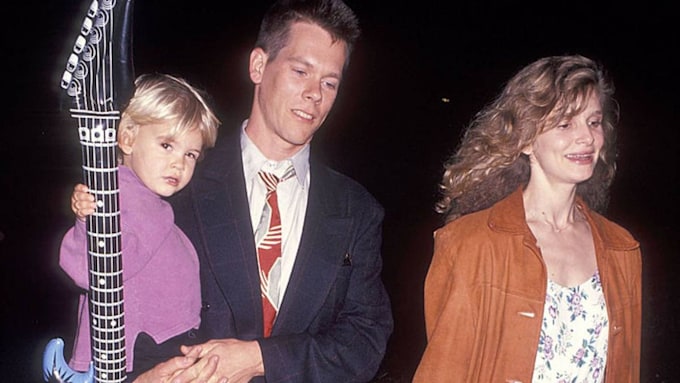 Kyra Sedgwick and Kevin Bacon with their son Travis when he was a baby 