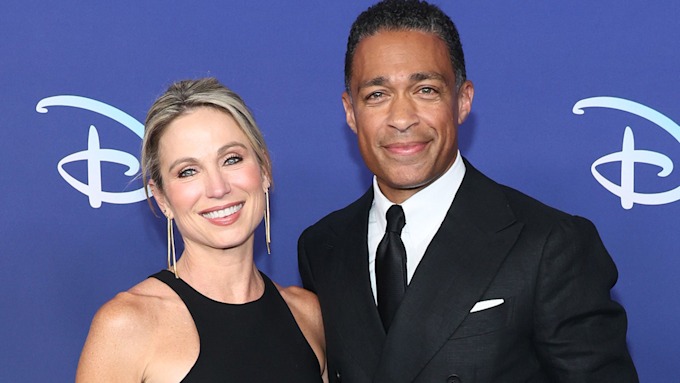 Amy Robach and T.J. Holmes at Disney event on red carpet