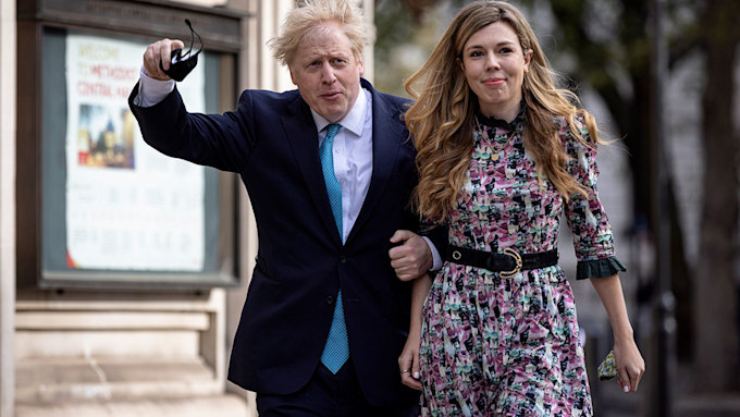 Boris Johnson and Carrie Johnson walking through London