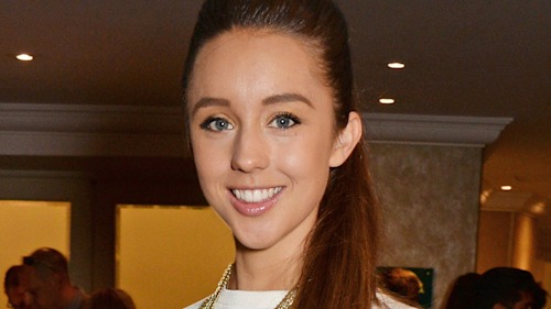 Emily Andre is the ultimate bombshell in unbelievable white dress