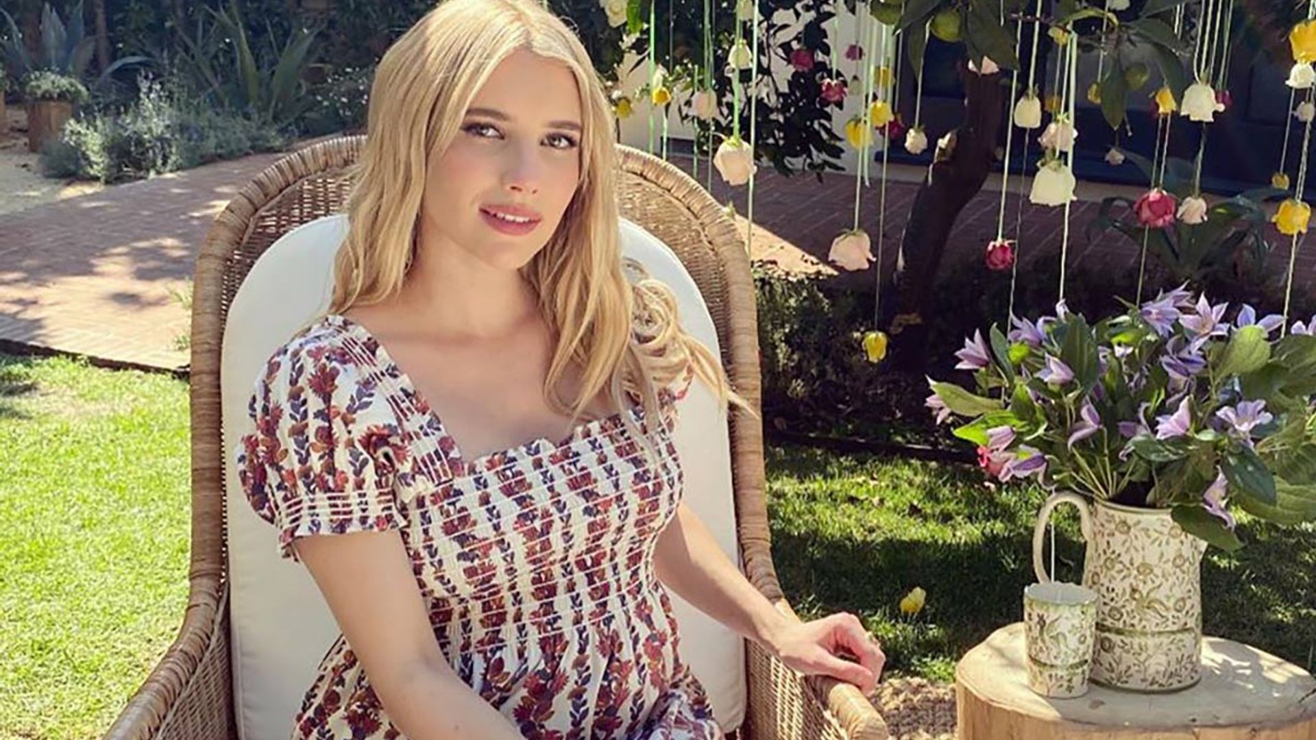 Pregnant Emma Roberts shows off decadent floral cake after baby shower