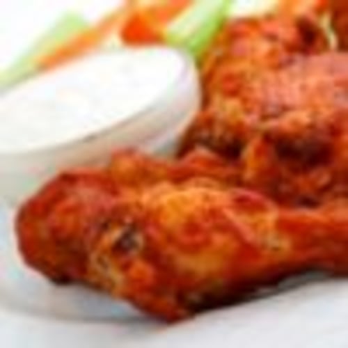 Buffalo wings with blue cheese sauce