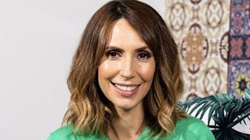Alex Jones looks gorgeous in fruity dress with belted waist