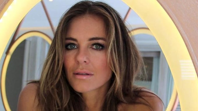 Elizabeth Hurley sizzles in yellow triangle bikini in steamy poolside ...