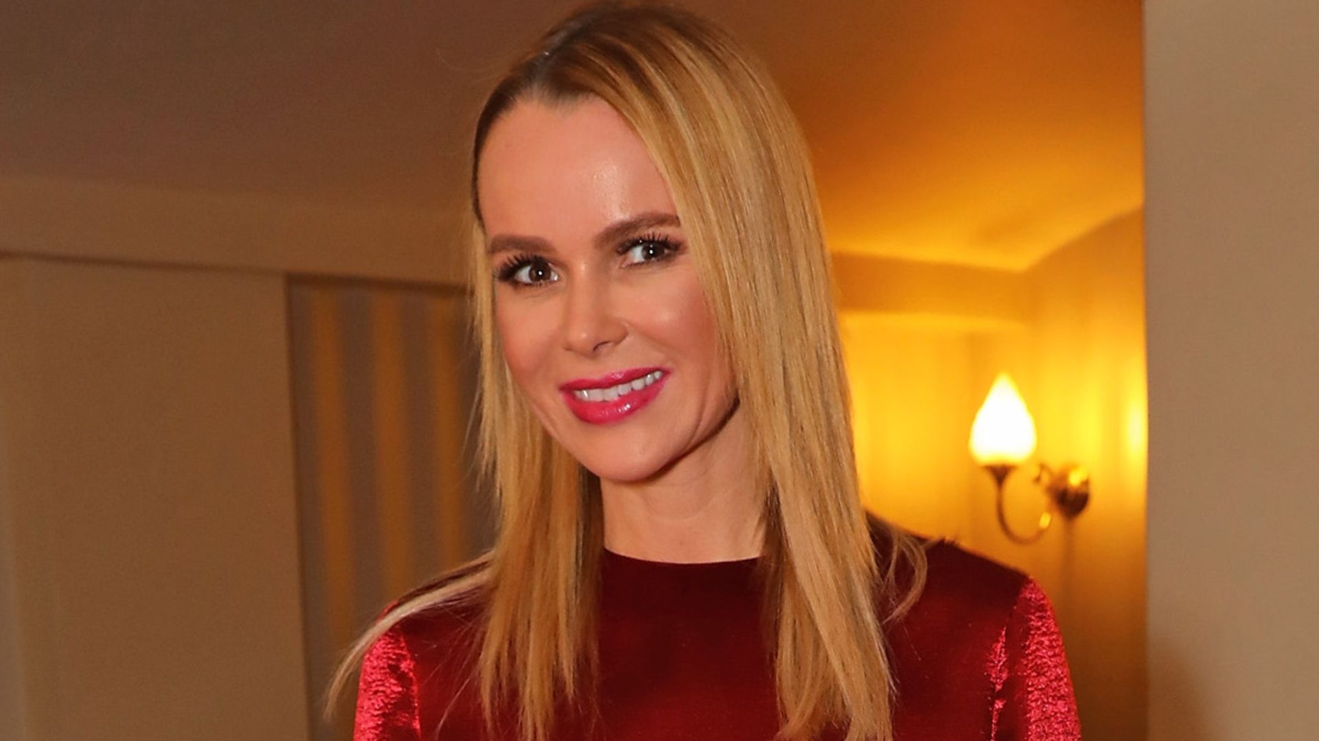 Amanda Holden sparkles in tiny red mini dress | HELLO!