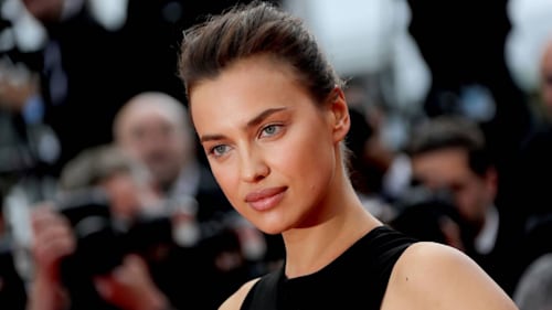 Irina Shayk flashes her sculpted abs in a crop top we want right now