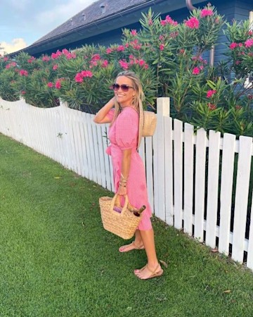 Reese Witherspoon thrills fans in a hot pink dress we want too | HELLO!