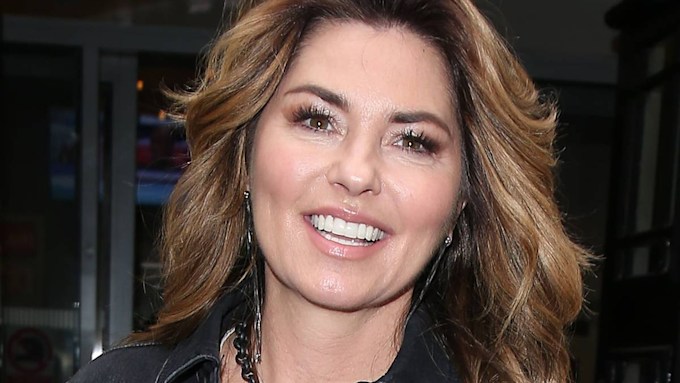 Shania Twain is iconic in strapless bodysuit and top hat in star ...