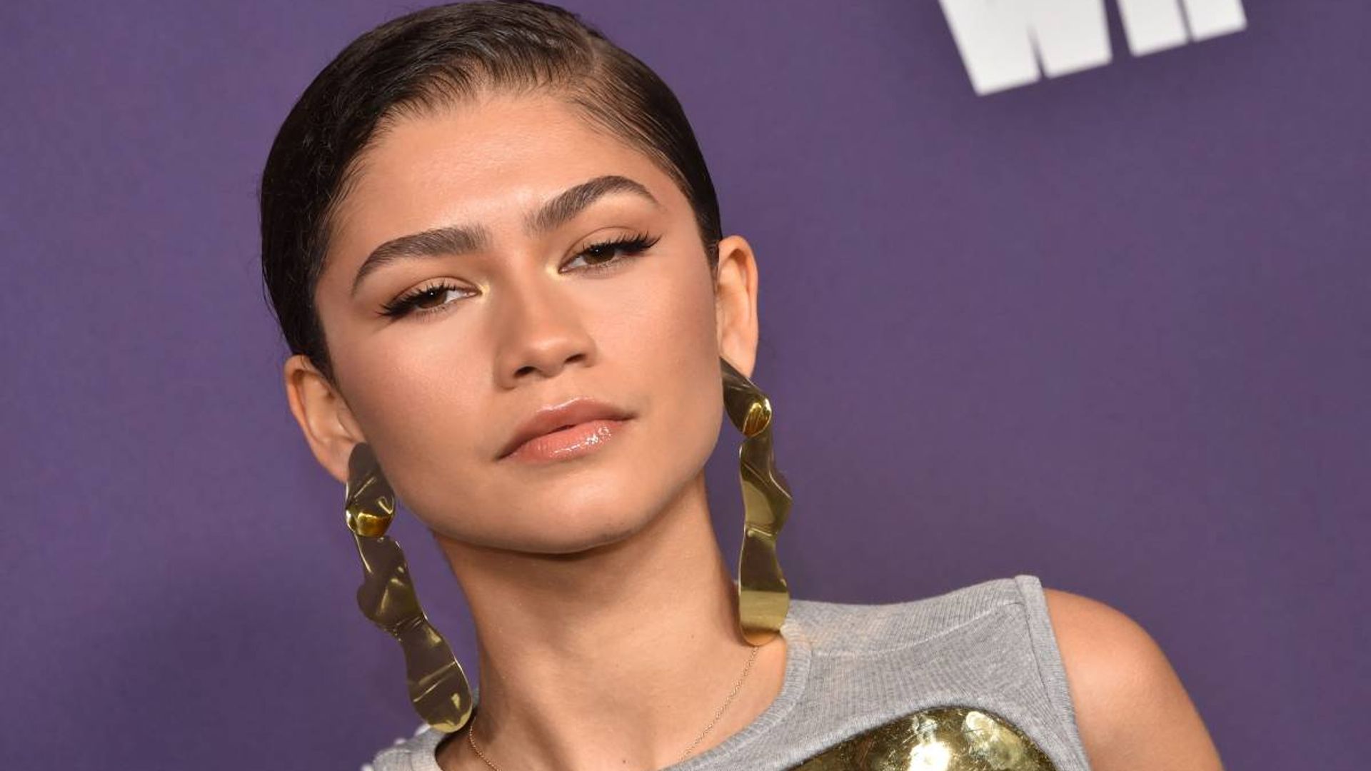 Zendaya causes a stir in a skintight metallic dress unlike anything you ...