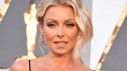 Kelly Ripa nearly suffered a wardrobe malfunction in a dreamy dress with a daring slit