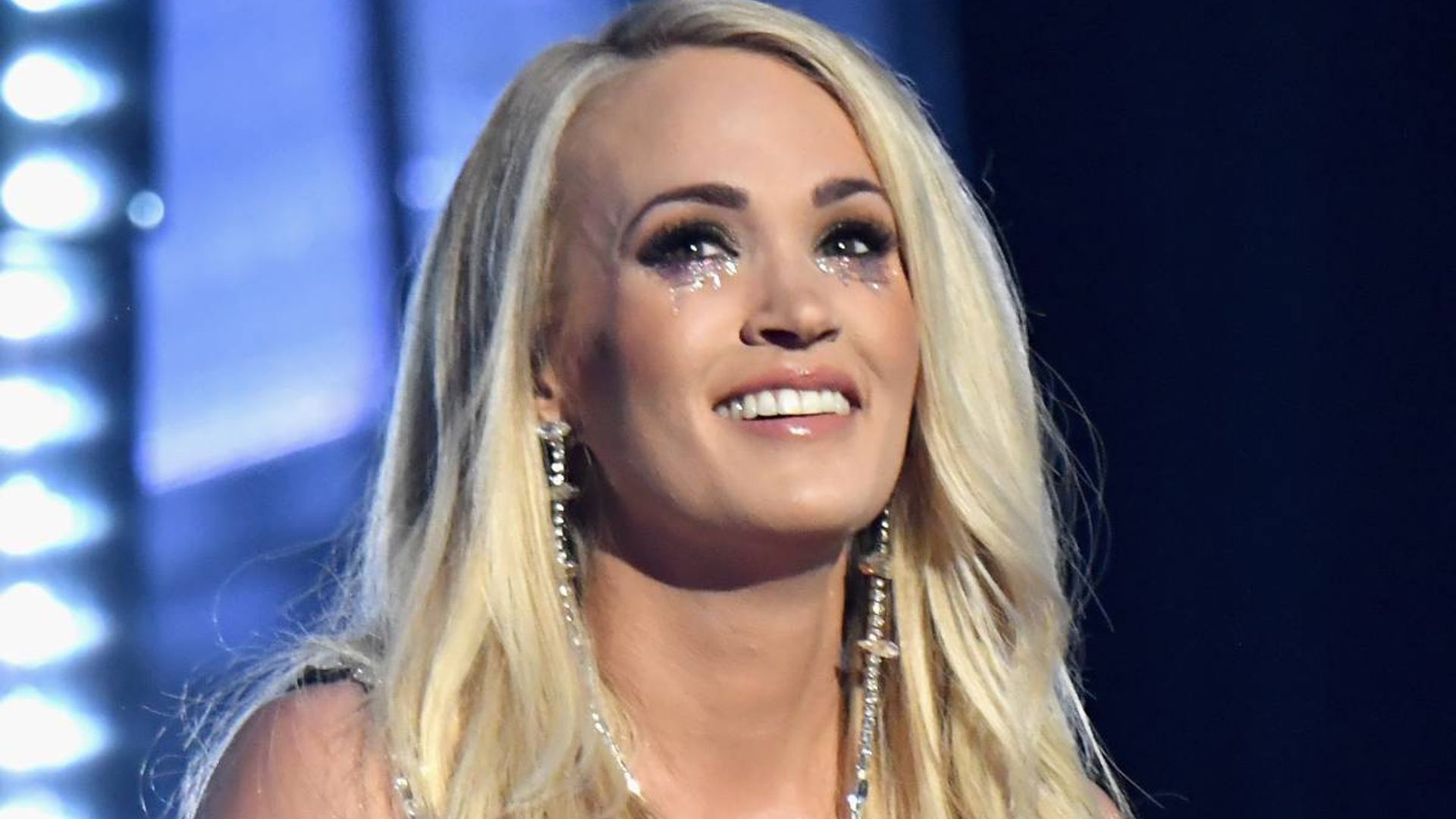 Carrie Underwood captivates fans in strapless dress as she celebrates ...